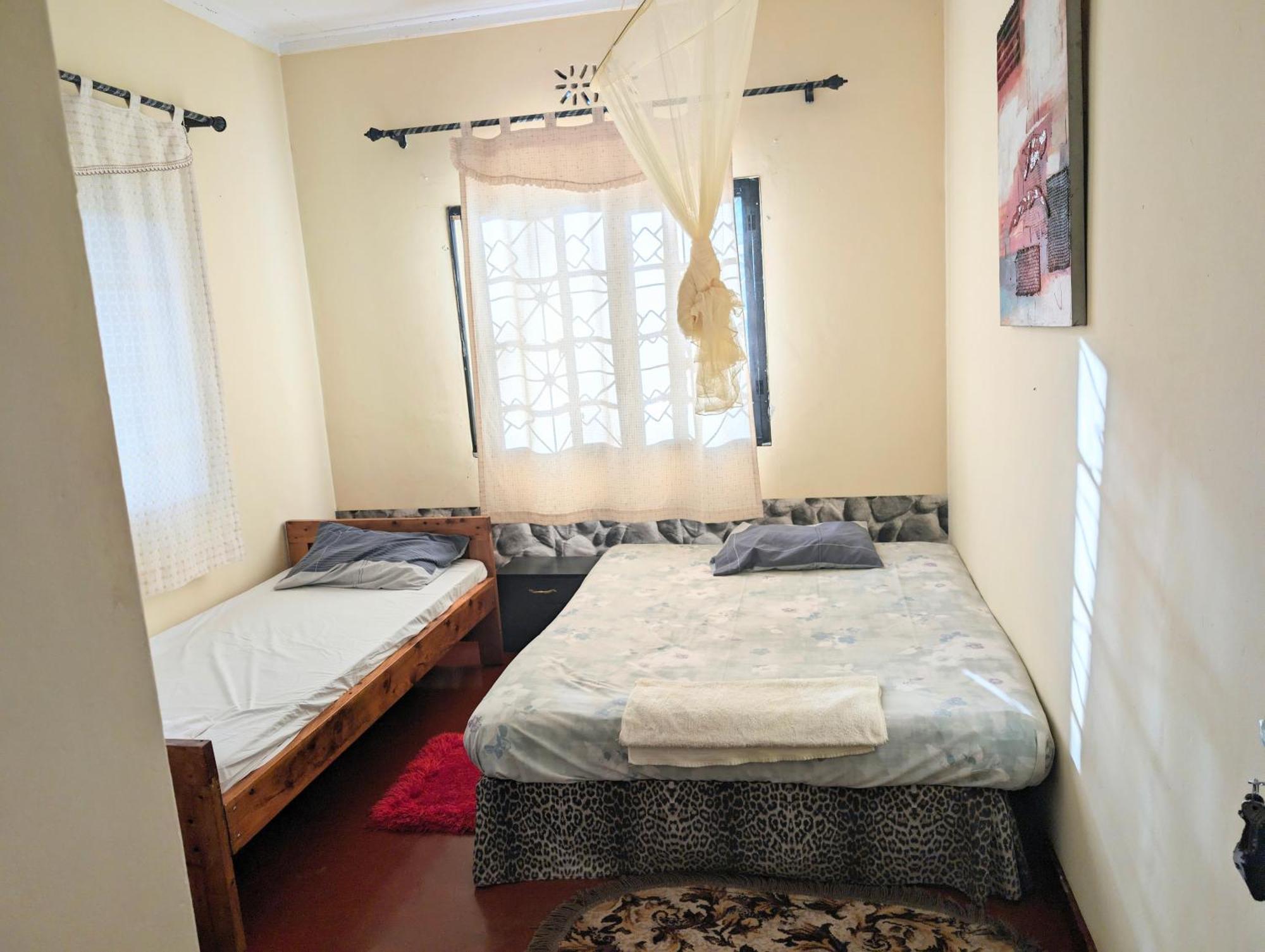 Dans Place Moshi Bagian luar foto